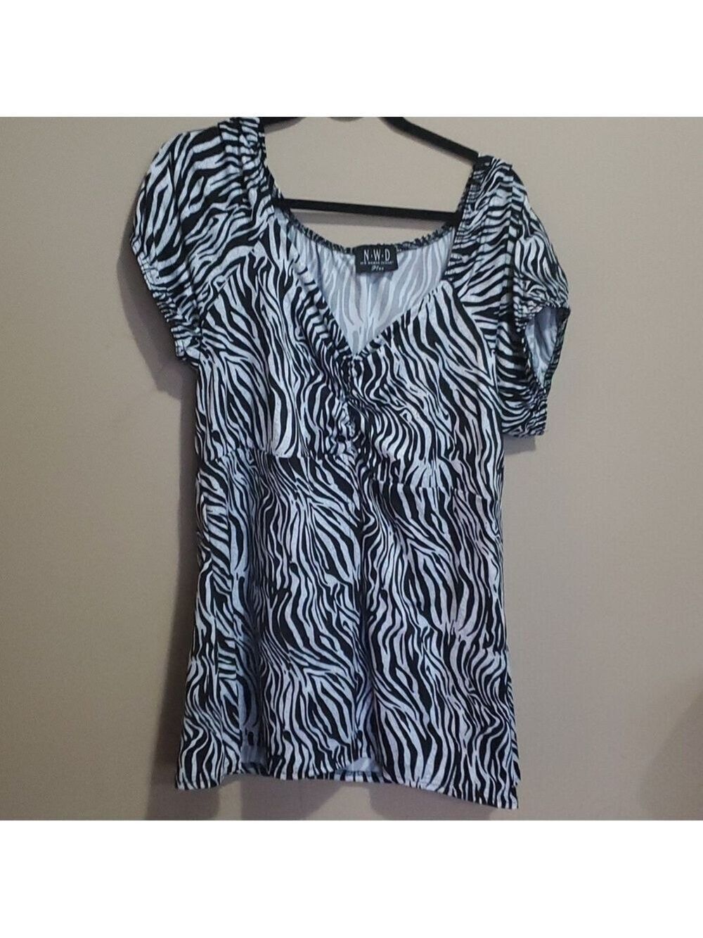 N.W.D top size 1x